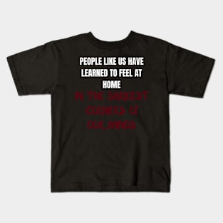 People like us have learned to feel at home Kids T-Shirt